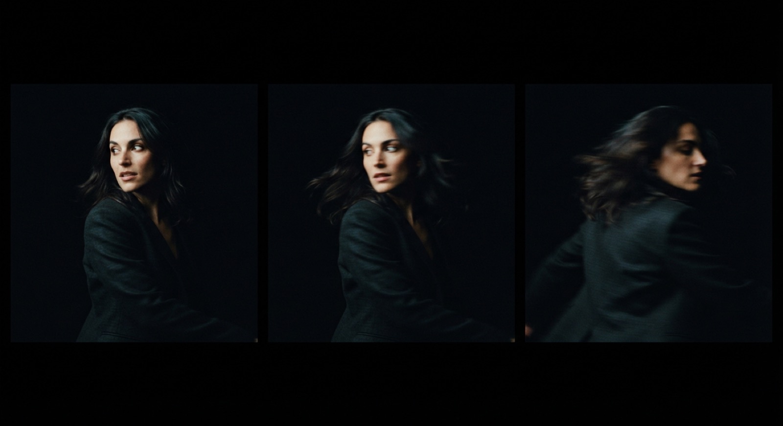 Fig. 1 — three frames from one clip that started from a still. The face holds; the motion is allowed to blur.
